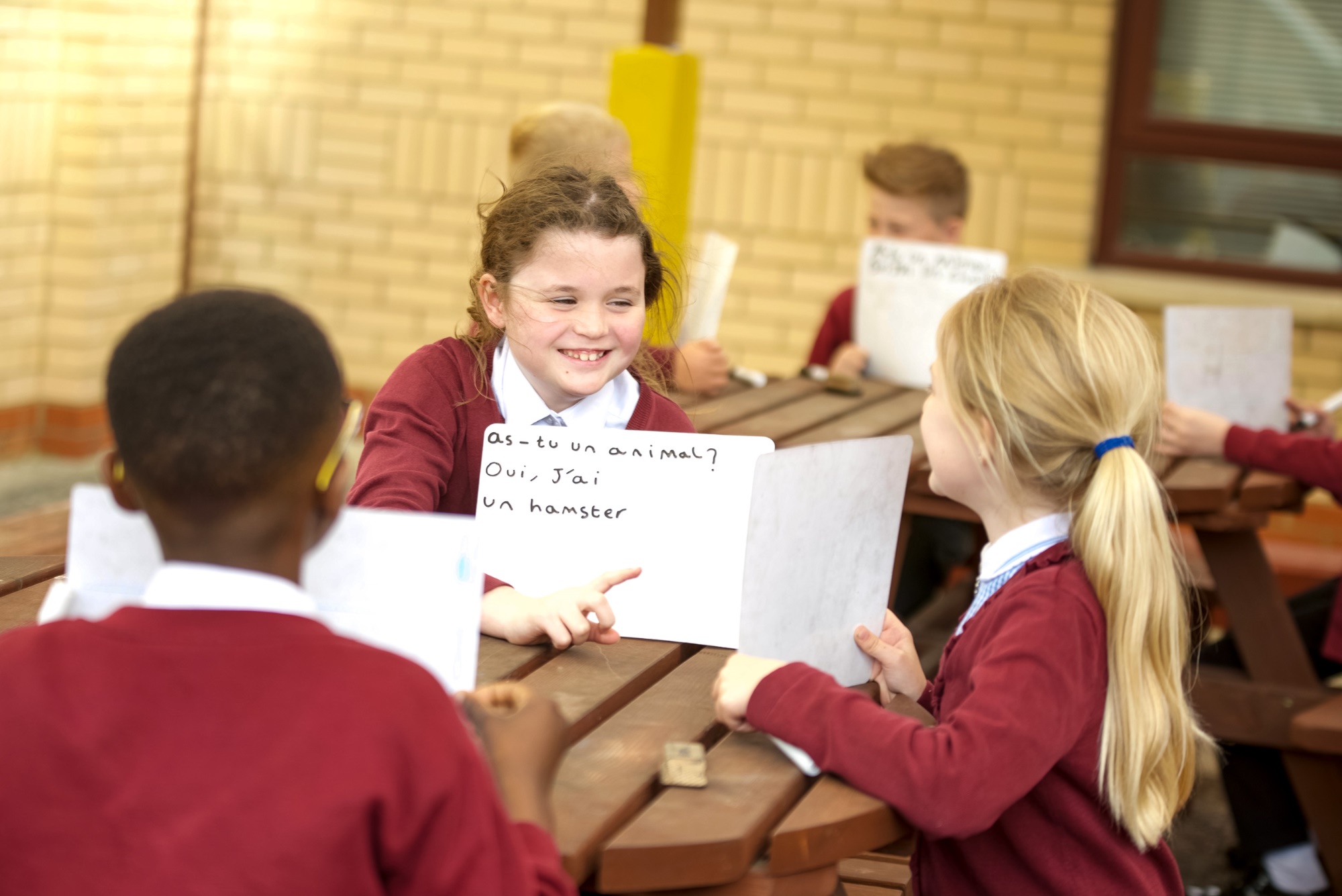 children working in outdoor area